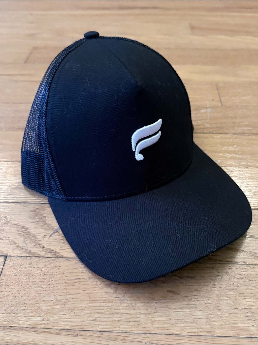 Fabletics Black Trucker Hat with White Logo